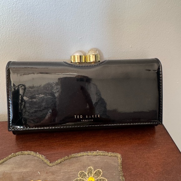 Ted Baker Handbags - Ted Baker Black Clutch/ wallet with Gold Accents and outside zipper.
